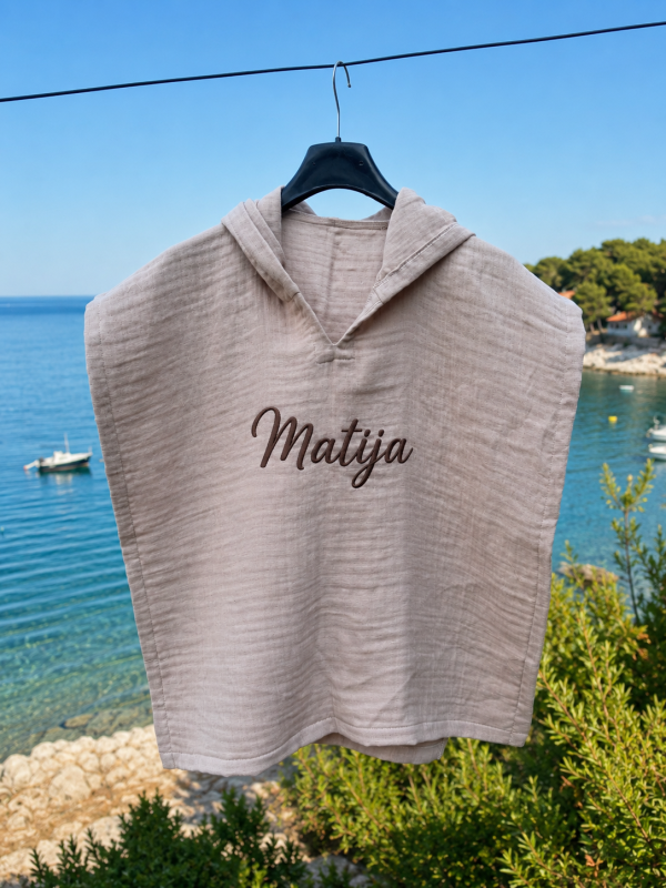 FD24A220-DF77-43B3-9115-4AC55F0CA165 Muslin pončo